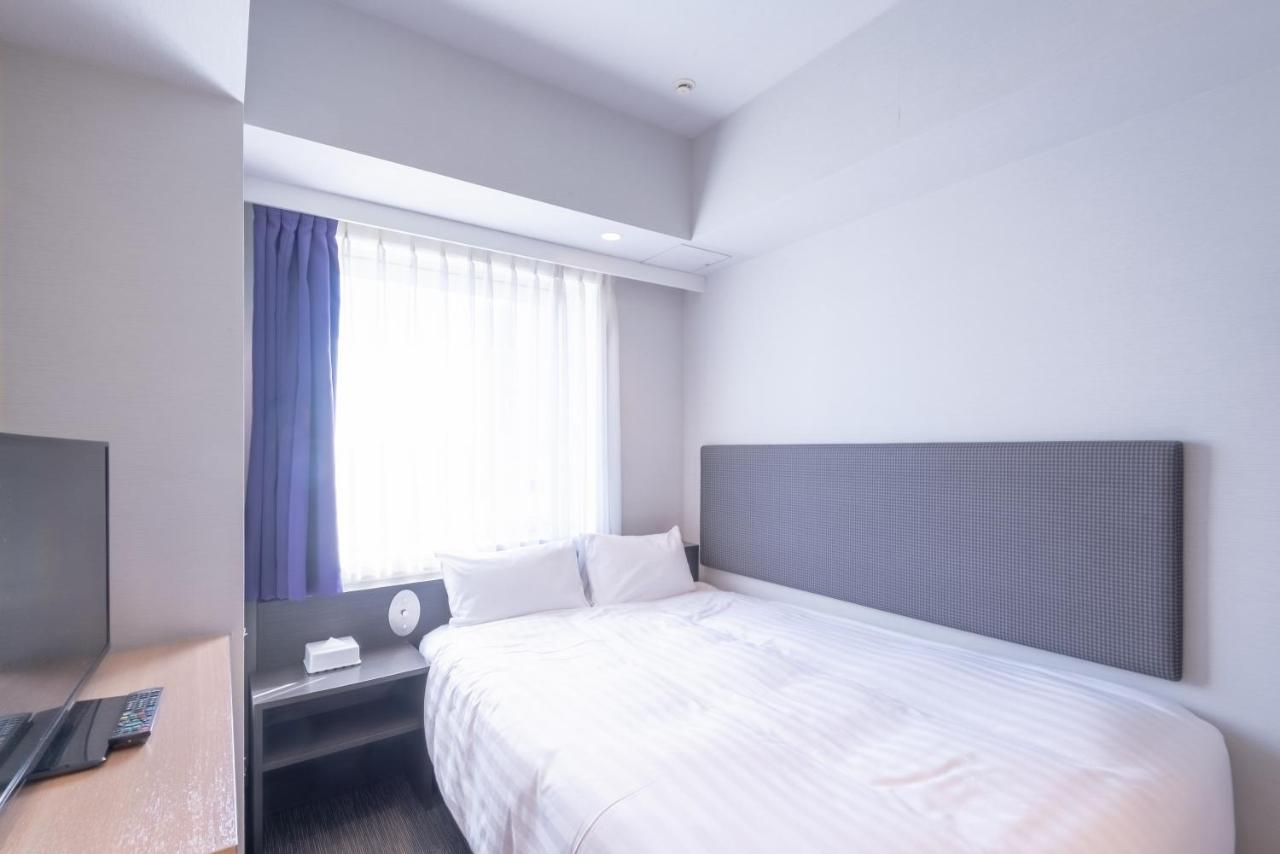 E Hotel Higashi Shinjuku Tokyo Esterno foto