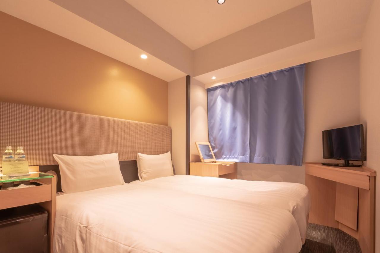 E Hotel Higashi Shinjuku Tokyo Esterno foto